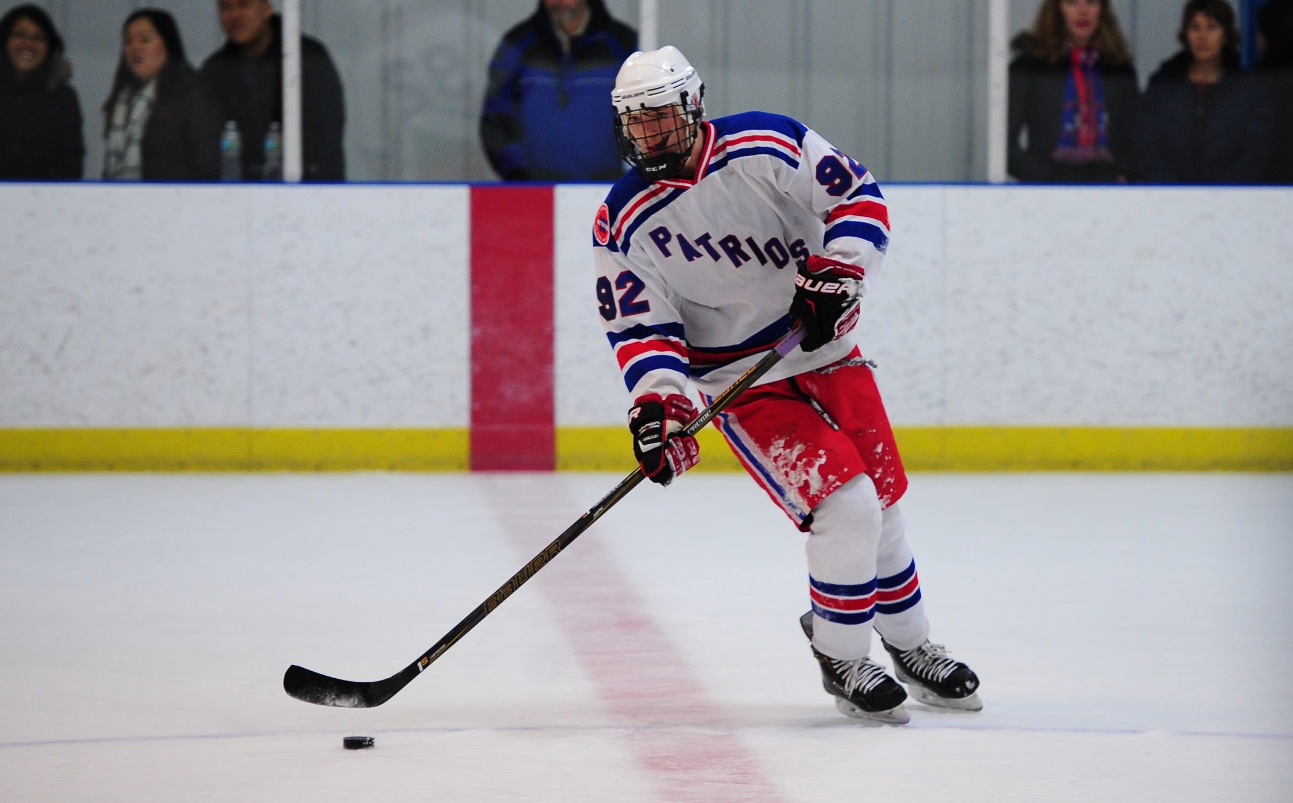 Ice Hockey: Team wins another close game; fists fly on both sides