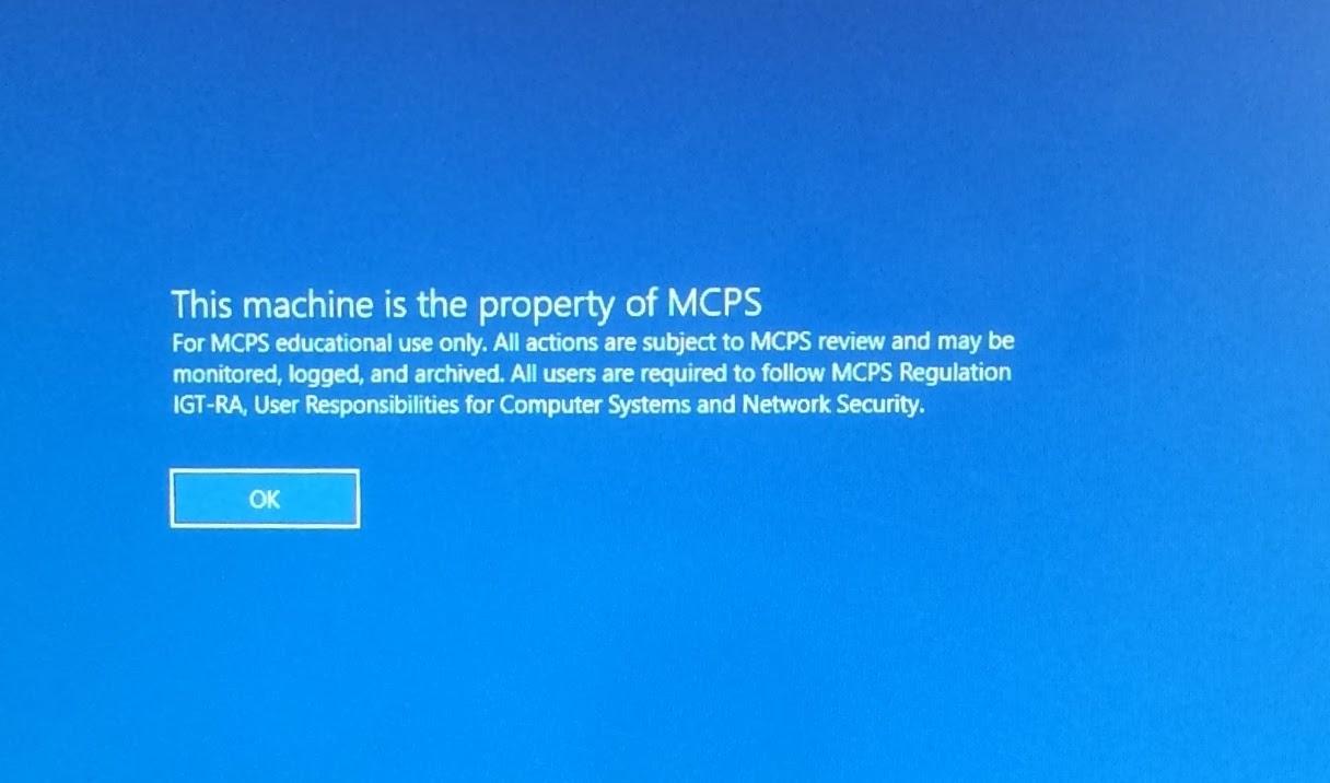 Teachers monitoring computer screens