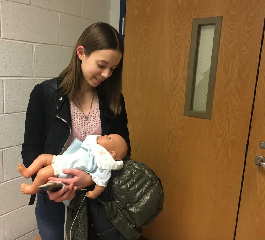 Sociology project teaches students what raising a child brings