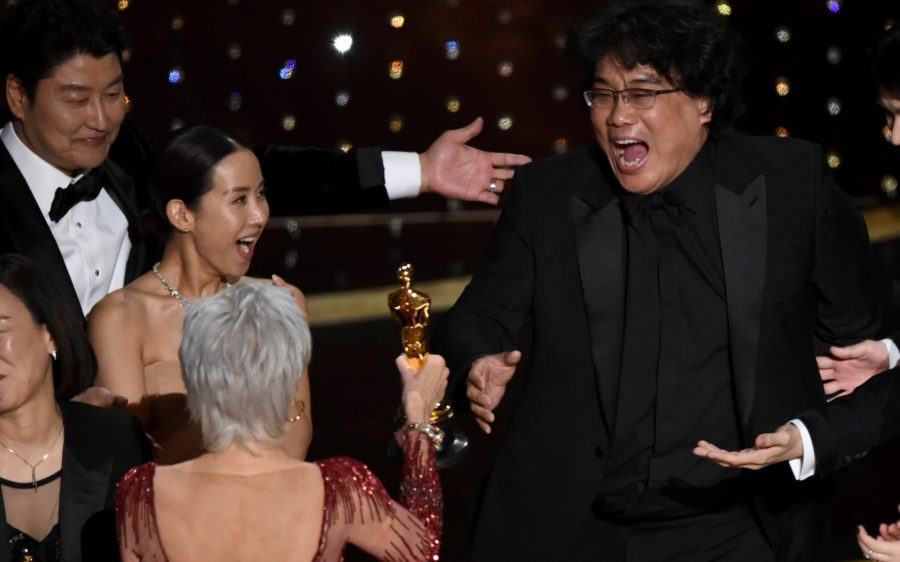 Oscars honor film industry, make history, shock viewers