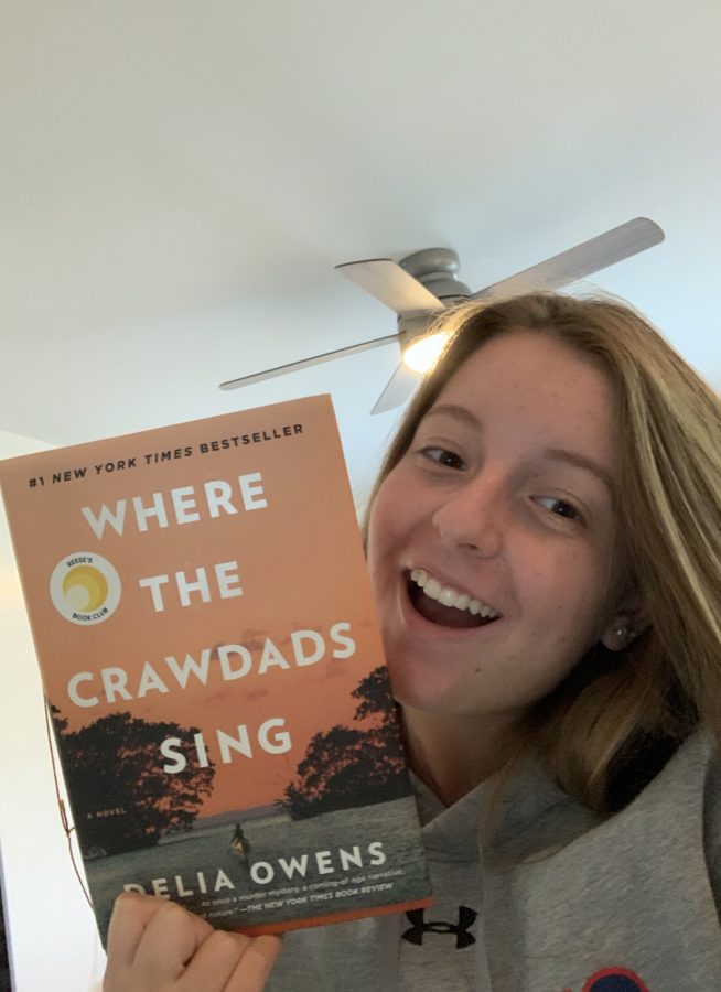 Front page editor Anna Keneally and Delia Owens book, Where the Crawdad Sings.