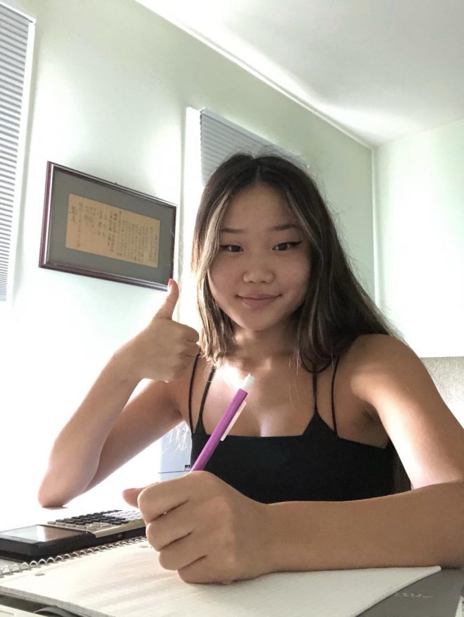 Junior Olivia Kim keeps up with her AP classes from home.