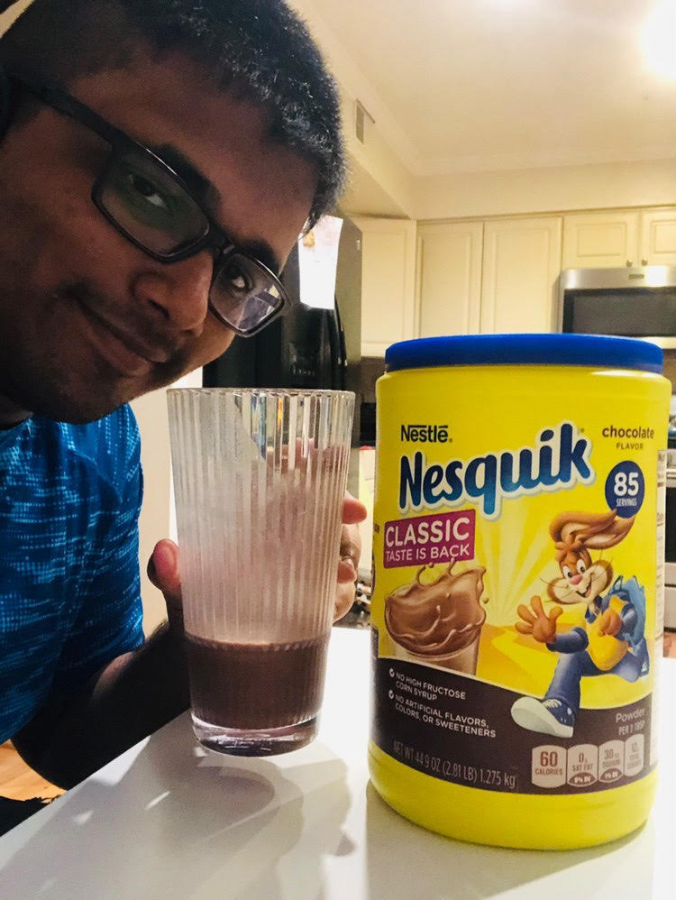 Senior Aryan Munot enjoys a glass of hot chocolate made with Nesquik chocolate mix.