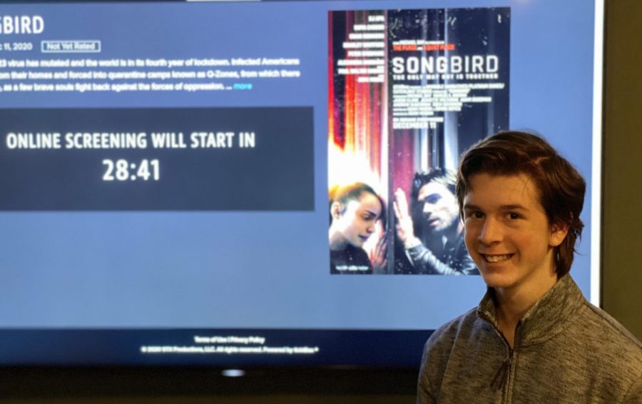 Junior Joshua M. Freedman watches an early premiere of the new film “Songbird” at his house on Dec. 9.