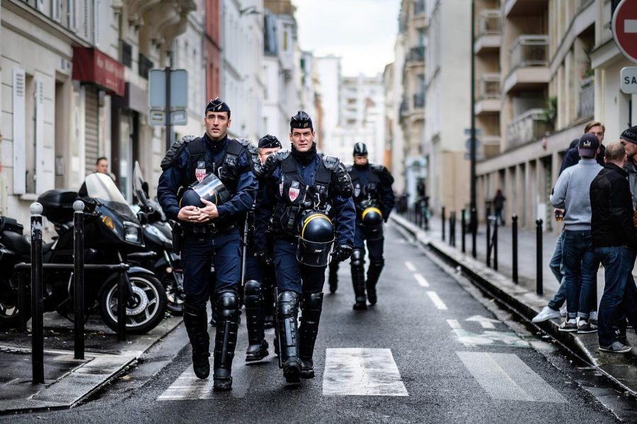 French Anti-Riot Police patrol the streets of Paris.