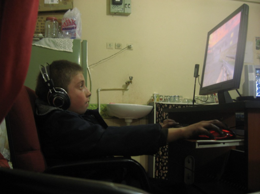 This boy is engrossed in an online video game, which provides powerful benefits.