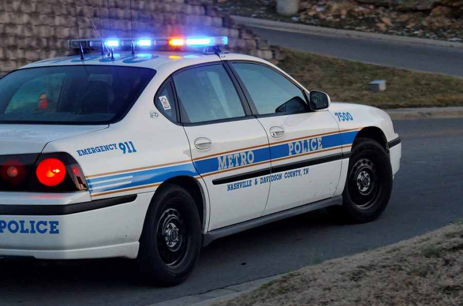 A Nashville police car, just like the ones used by the police department during the Nashville bombing, is driven toward its next assigned emergency.