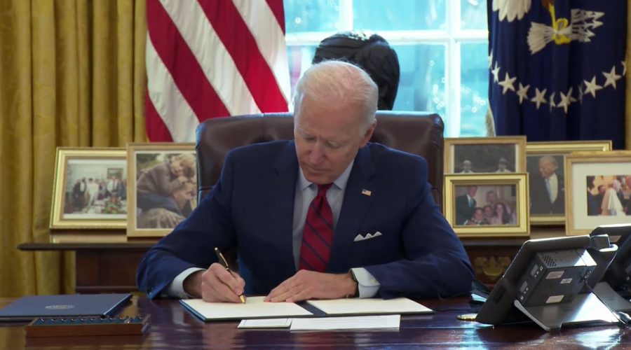 President Joe Biden signs Executive Order on Strengthening Medicaid and the Affordable Care Act at the White House on Jan. 28.
