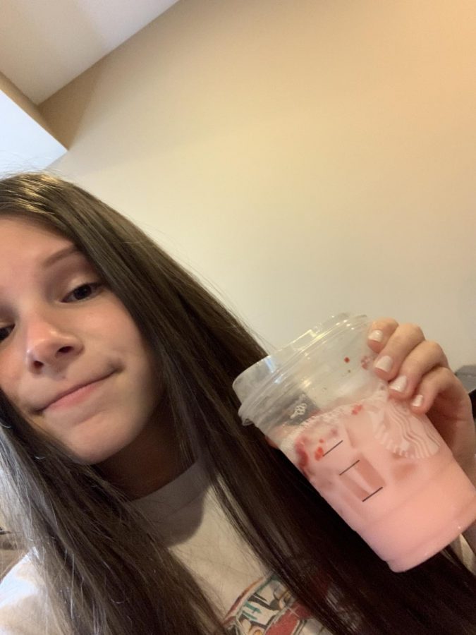 Junior Nicole Wasserman enjoys her favorite drink from Starbucks.