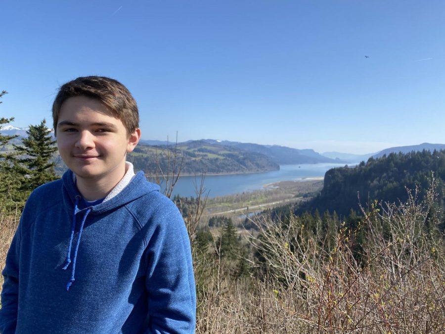 Junior Luke Jordan poses in front of the Columbia River in the outskirts of Portland, Oregon.