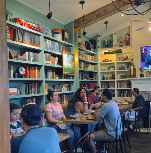 The front dining room of Sisters offers interesting items to look at when conversation gets boring, such as books, antiques and family photos. The multi-room structure of the restaurant creates a quaint atmosphere and a home-like feel.