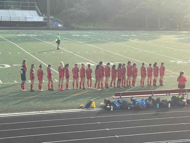 The girls JV soccer team gets ready to kickoff their home opener against Quince Orchard.