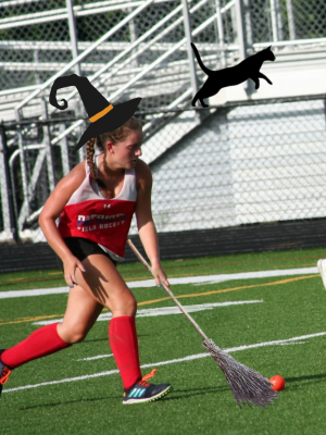 Senior Anna Keneally flies across the field to goal with supernatural speed.