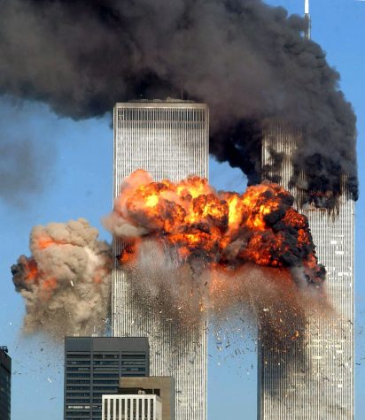 The World Trade Centers North Tower, engulfed in flames moments after American Airlines flight 11 strikes.