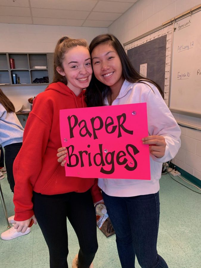 Seniors Katelyn Cheng and Olivia Smith attend a Paper Bridges club meeting in November 2019.