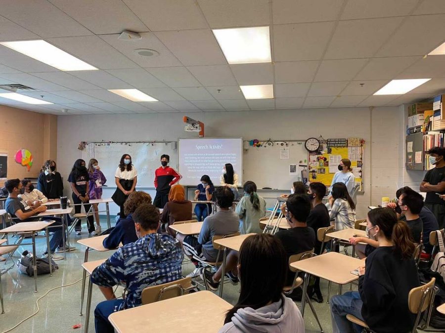 Model United Nations club meets to work on a speaking activity.