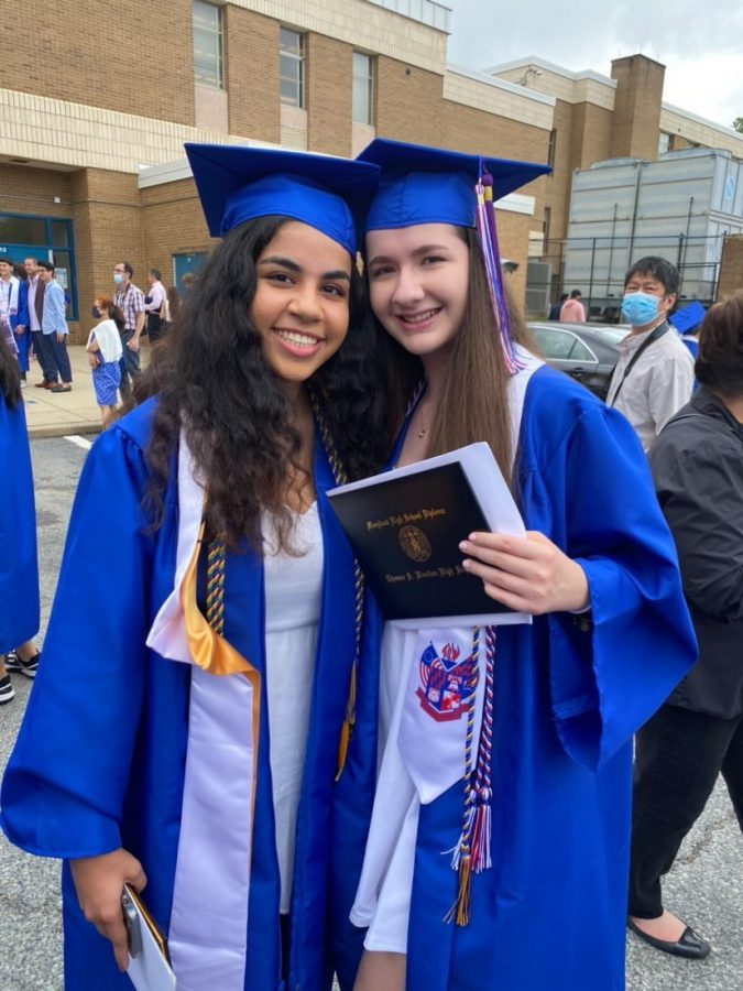 Class+of+2021+graduates+Medisa+Kazemi+Nia+and+Lauren+Ullman+wear+honorary+tassels%2C+stoles%2C+caps+and+gowns+for+their+graduation+ceremony.