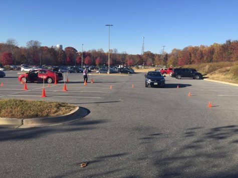 A student prepares for their drivers test by practicing parking skills.