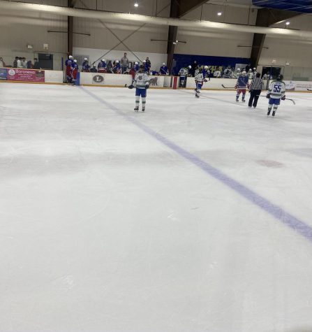 Varsity hockey switches lines in a game versus Churchill on Dec. 3.
