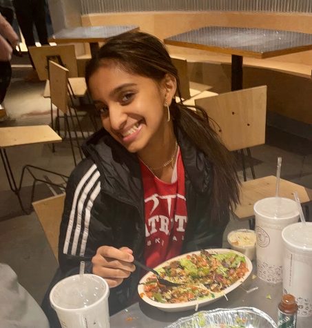 Freshman captain Maddy Mathew enjoys a team dinner prior to the teams blowout victory over Walter Johnson. The players hope that games, practices and team events can resume soon.