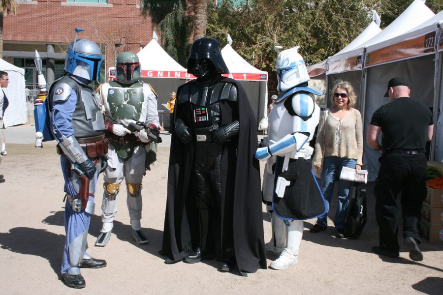 Fans dress up as Boba Fett and other Star Wars characters at a local fair.