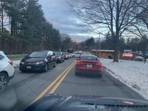 Buses leaves school in the morning traffic on Jan. 19.