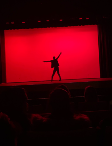 Freshman Jae Edwards dances in 6.5 inch stilettos at Thursday Night Live on Feb. 17.  “I did have mixed feelings because it was a huge risk from both a physical perspective and a mental perspective,” Edwards said.