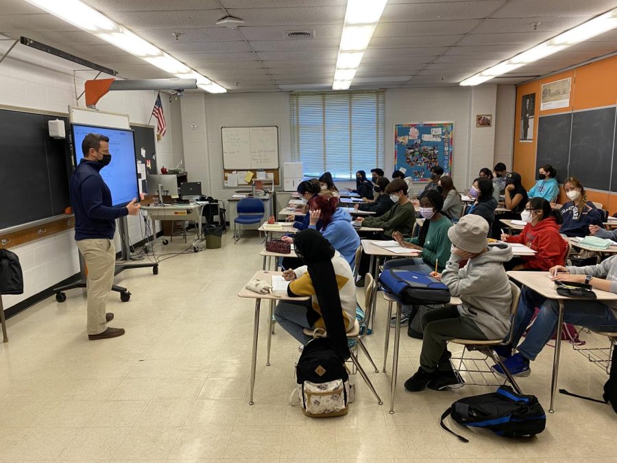 David+Marchand+teaches+a+seventh+period+Honors+Precalculus+class+on+Feb.+28.+Students+are+learning+about+trigonometric+identities.