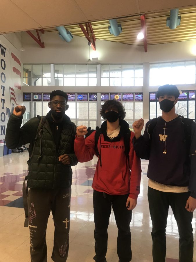 Juniors Yule Pieters, Max Fuster, and Garrick Heitz clench their fists high in support of Black Lives Matter and in support of Black History Month. Heitz, an ally of the movement, aims to encourage others to “support the month and spread awareness of racism that haunts our country.”