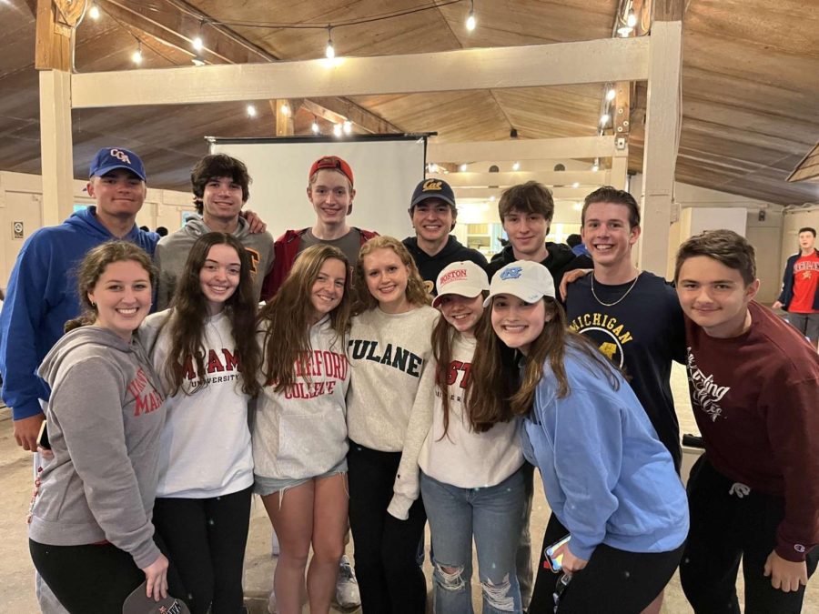 A group of the Common Sense seniors wear their college sweatshirts at the senior picnic.