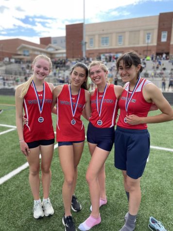 The girls county A 4x8 m dash team (race order: Mei Rodgers, Maya Gottesman, Rebecca Vazconez and Victoria Ketzler) celebrate winning their medals on Wednesday May 11.