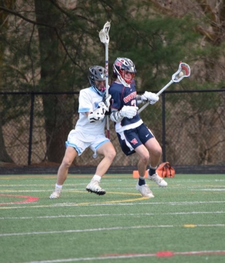 Sophomore attackman Michael Murphy
slashes to the goal in a game versus Whitman.