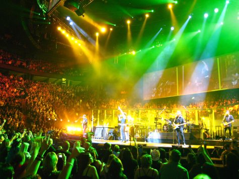 Bon Jovi performs at a large concert. Now that COVID restrictions have been lifted, concerts like these will be more common.