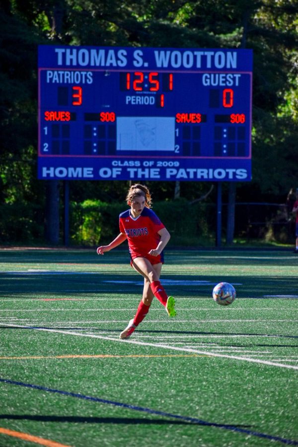 The+JV+girls+soccer+team+started+their+season+with+a+decisive+6-0+win+against+Rockville.+Sophomore+Marissa+Cook+is+a+key+part+of+the+teams+defense.