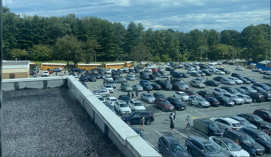 The student parking lot after school is filled with cars by students and parents, creating hazards.