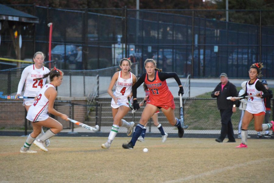 Freshman Nicole Subiela races against a swarm of Quince Orchard defenders to get possession of the ball.