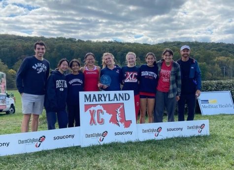 Varsity girls Annie Sun, Aanya Tiwari, Charlotte Chang, Maya Gottesman, Victoria Ketzler, Mei Rodgers, and Rebecca Vasconez celebrate their first place finish at the MDXC Invitational on Oct. 8.