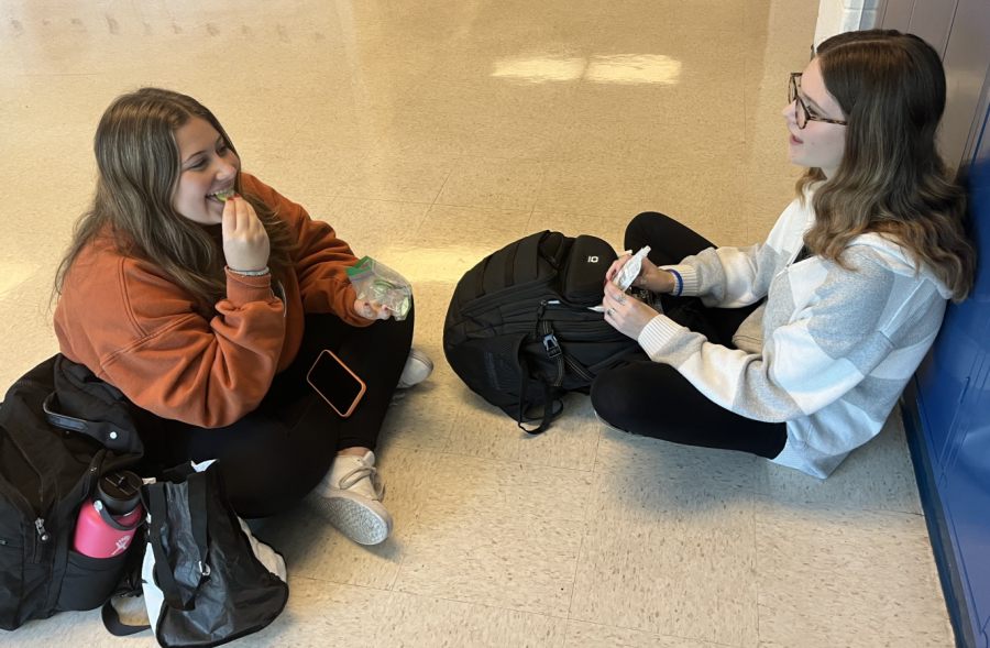 Seniors Kate Messite and Jamie Zweig eat together at lunch without having to worry about social distancing.