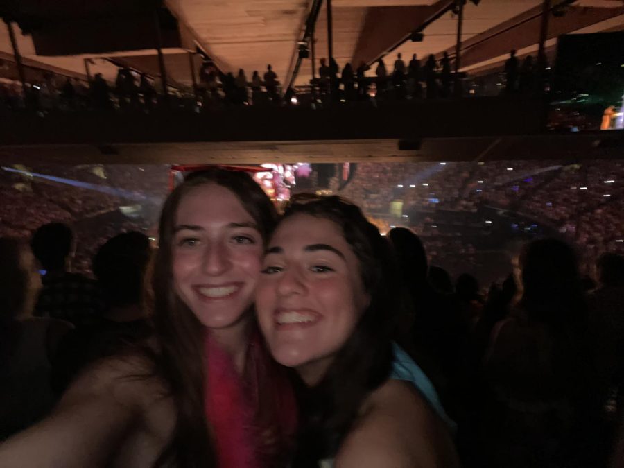 Senior Rae Weinstein and sophomore Lea Weinstein pose from their seats at Madison Square Garden during one of Styles electrifying performances on Sept. 14