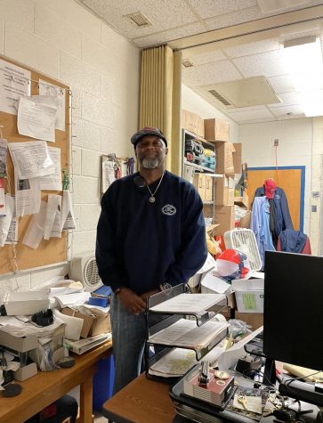 Building service manager Anthony Murray works in his office before the school day begins.
