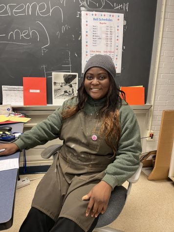 Afua Kyeremeh said she enjoys her new job as a photography and ceramics teacher and hopes to share her stories growing up in London with her students.