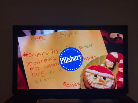 Pillsbury advertises with Christmas promotions, signifying the start of the season.