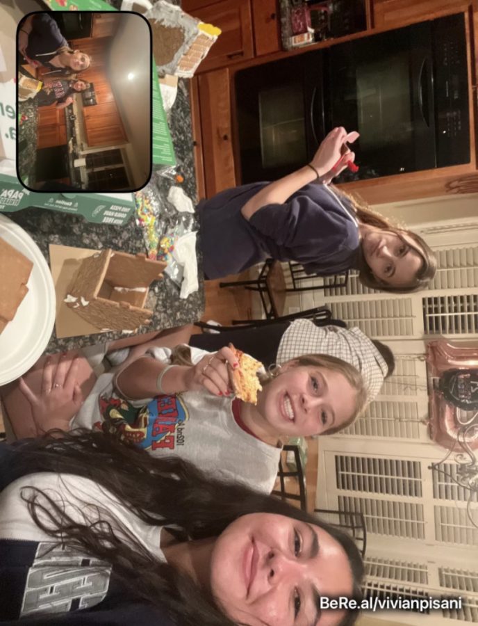 Senior Vivian Pisani makes gingerbread houses with her family friends to get in the Christmas spirit.