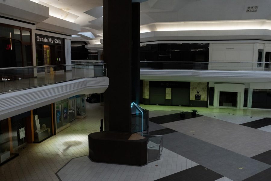 The Central Court of Lake Forest Mall, once alive with bustling people and illuminated storefronts, now lies empty.
