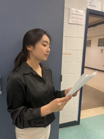 Junior Carolyn Fu practices for her mock interview for AOIT after school on Feb. 15.