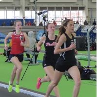 Junior Victoria Ketzler (far left) chases her opponents in the girls 1600 meter varsity race at the Ocean Breeze Invitational in Staten Island, NY.