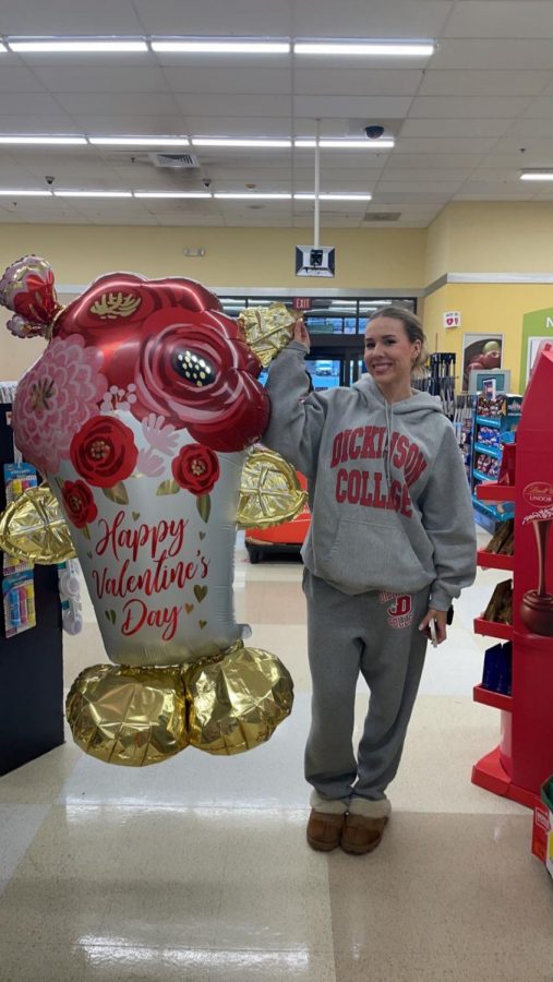 Senior Katie Bowman shops for Galentines day decorations at Giant.