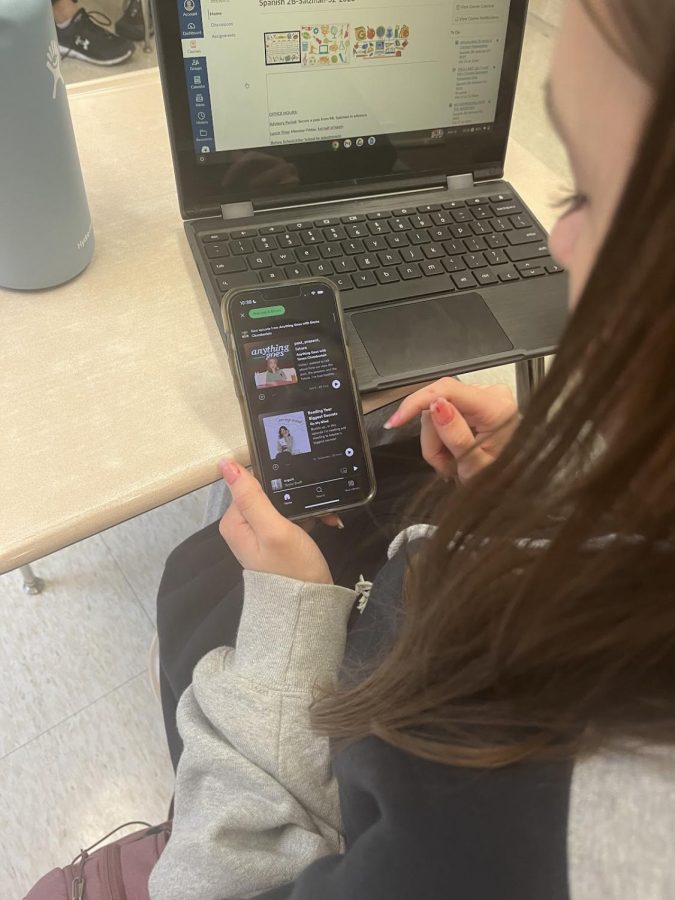 Freshman Ava Eisenman decides to listen to Emma Chamberlain’s podcast Anything Goes while studying for her upcoming Spanish test.
