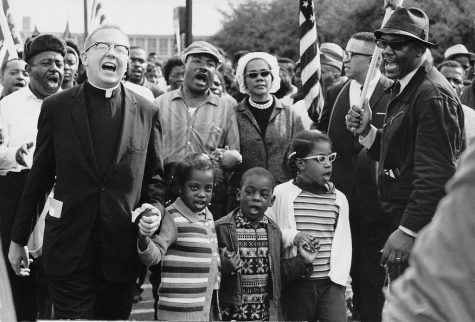 Civil Rights Movement co-founder David Abernathy marches with Martin Luther King Jr. from Selma to Montgomery in 1965.