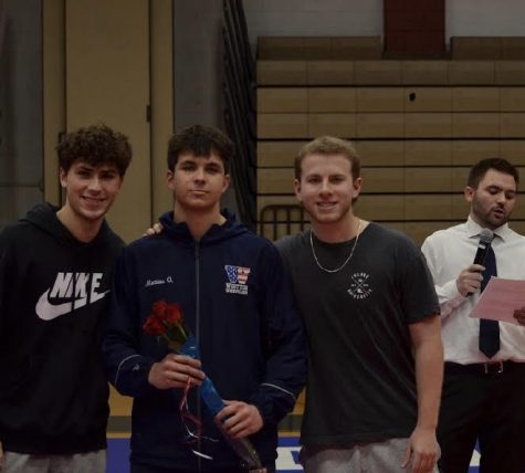 Coach Shane Bramble announces Senior Night while seniors Josh and Max Mirsky walk out Mattias Onel in place of his parents due to COVID-19 complications.